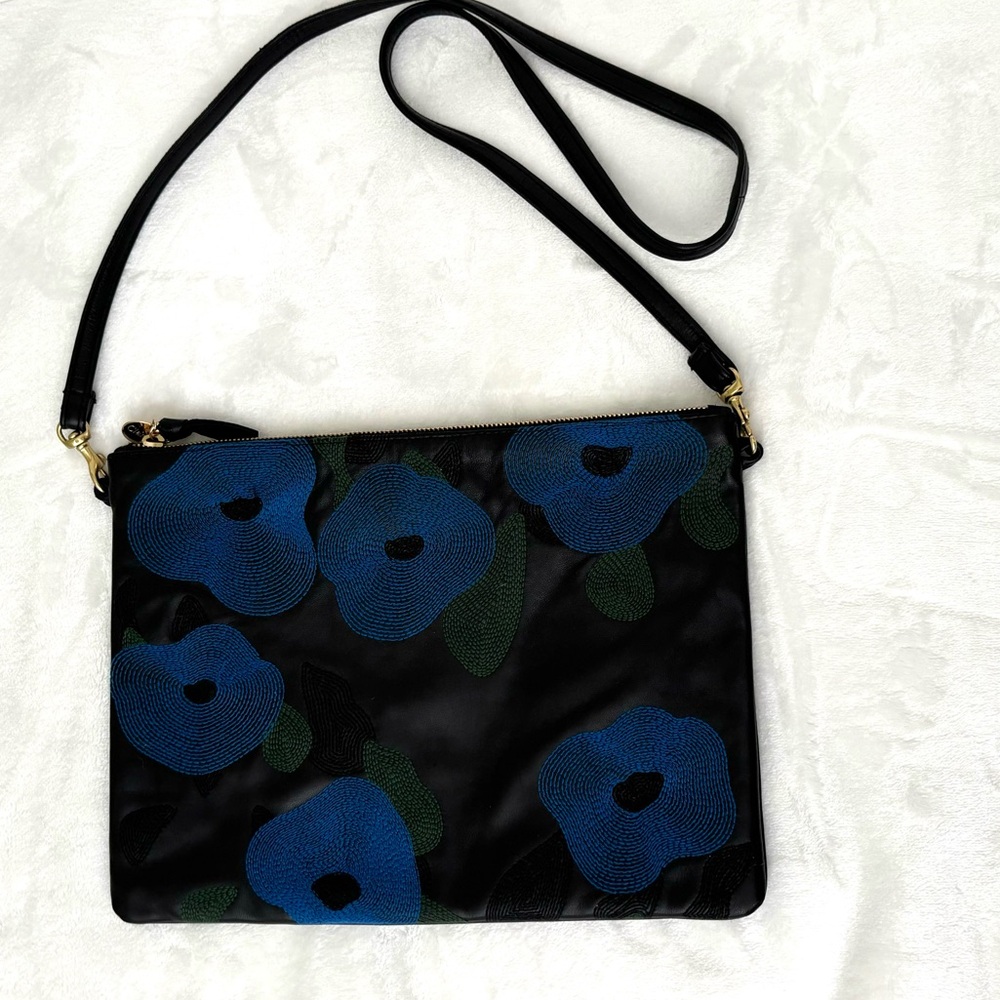 Worn Clare V single sac clutch.